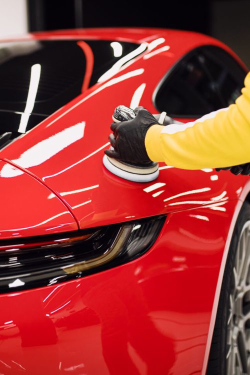 Car,Detailing,-,Worker,With,Orbital,Polisher,In,Auto,Repair